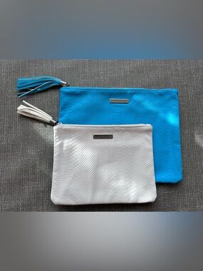 Rodan + Fields set of 2 convention swag wristlets cosmetic bags white & blue